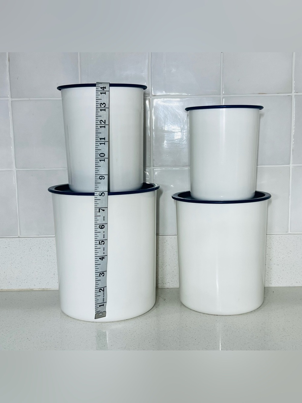 Tupperware White Storage Canisters with Dark Blue Trim